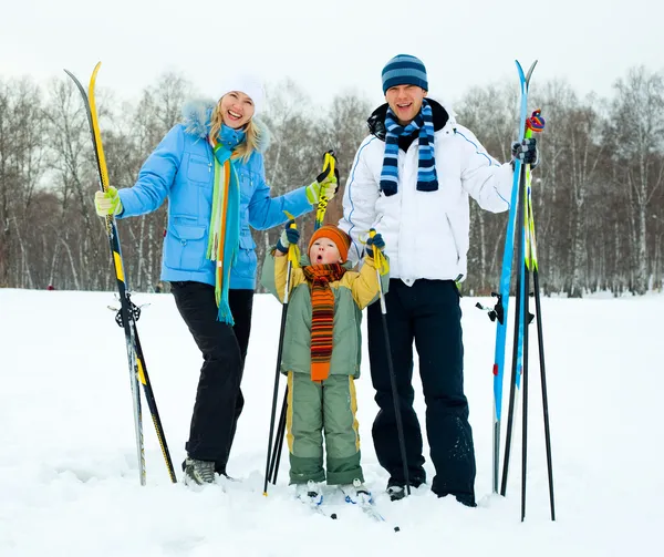 Happy family skiing