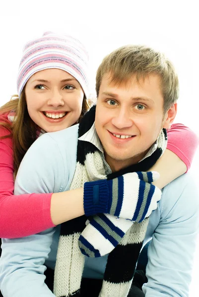 Happy couple dressed in winter clothes