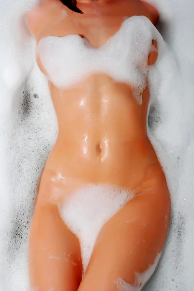 Female body and white foam