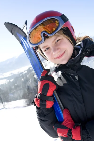 Happy girl with ski