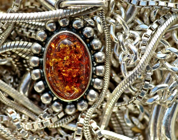 Silver little chains and amber pendant