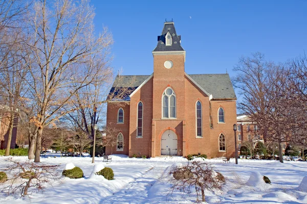 Old chapel on a college campus in winter