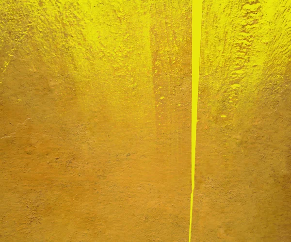Yellow gloss paint plaster background
