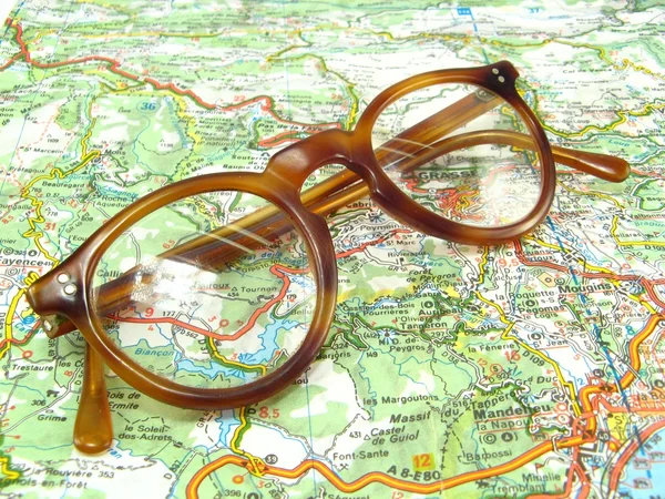 Glasses on a map