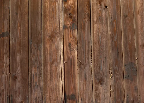 Detail of wood on the side of an old bar
