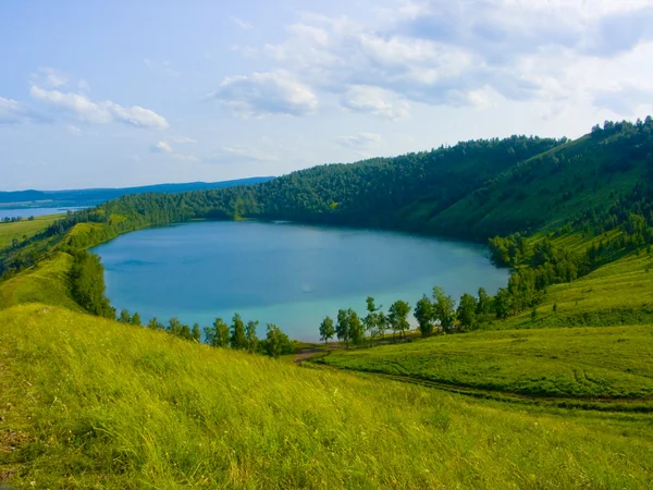 Lake in a hollow of a hill