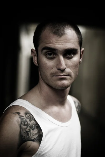 Young tattooed man by Aleksandar Kosev Stock Photo tattooed man