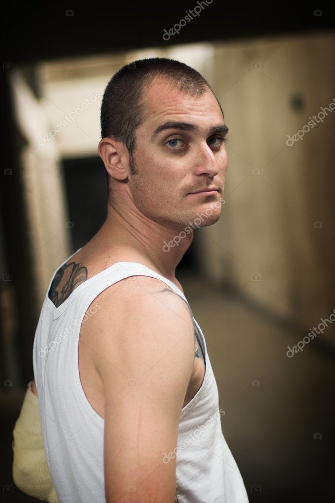 Portrait of young tattooed man