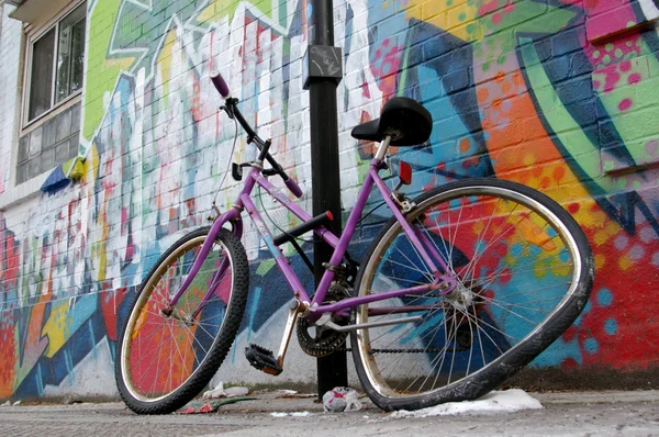 Street graffiti wall parked bycicle