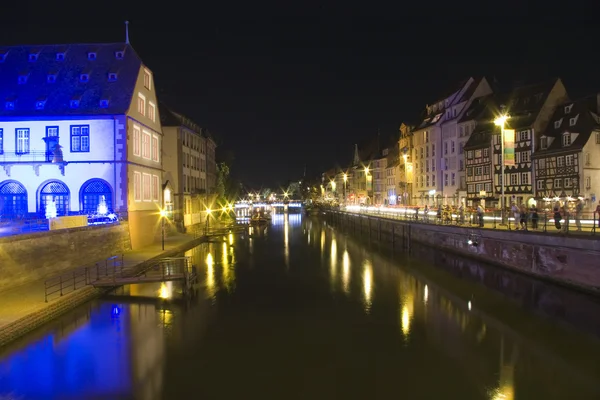 Bridge and quay in old town by night