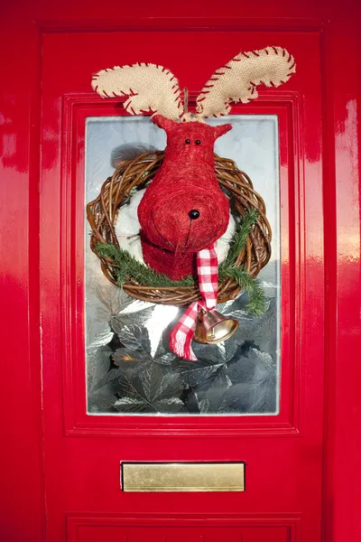 Christmas front door with handmade reindeer wrea