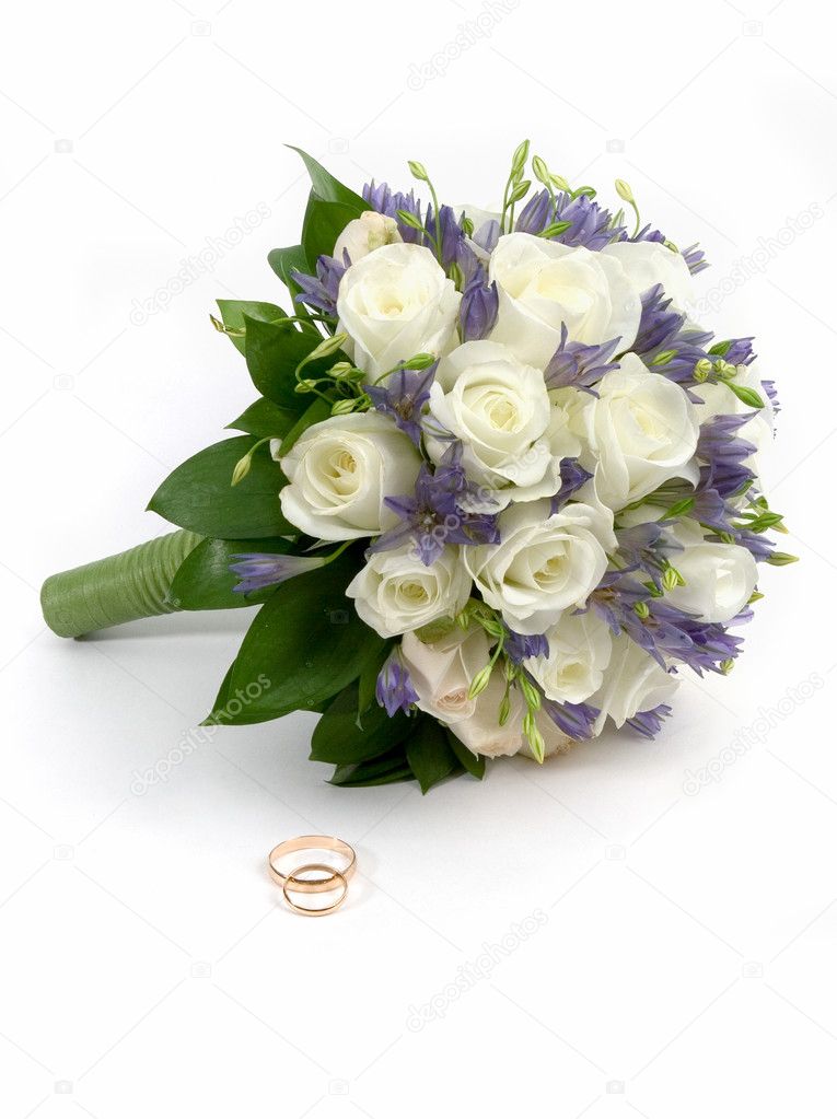 Wedding bouquet and rings Isolated on white