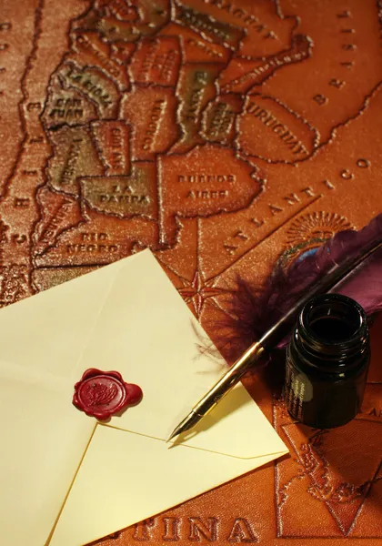 Letter , Quill, Inkwell on map