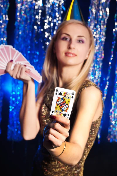 Girl in cap with a card in a hand — Stock Photo #2132925