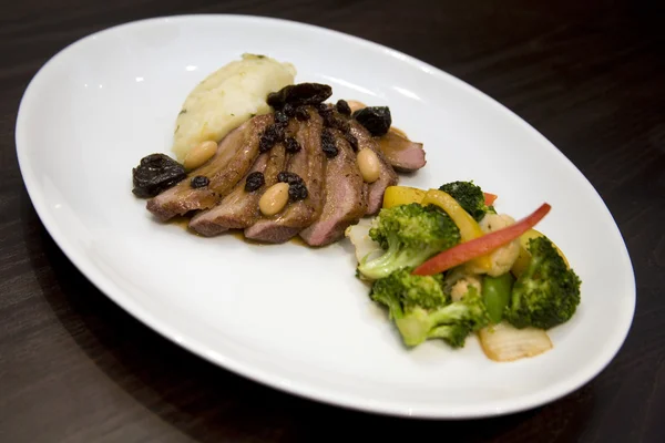 Honey glazed roasted duck breast with dr
