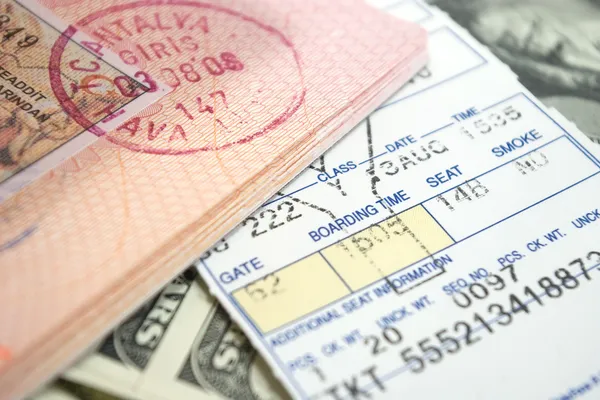 Ticket passport and dollars