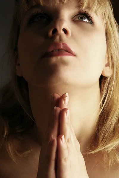 The woman prays portrait