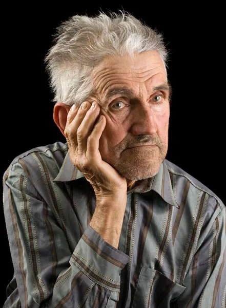 Old man on black background