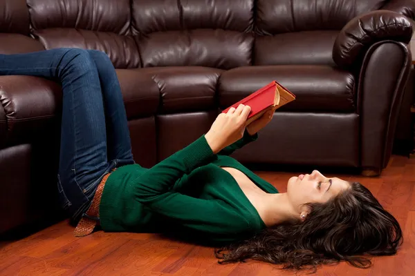 Young lady reading a vintage book