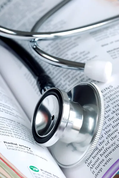 A stethoscope on the medical book