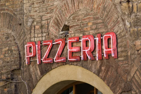 Neon pizzeria sign