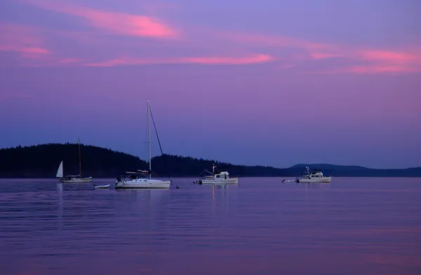 Boats at sunset in shore of Lopez Island