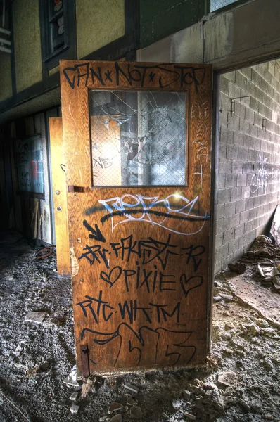 Graffiti on a Wood Door