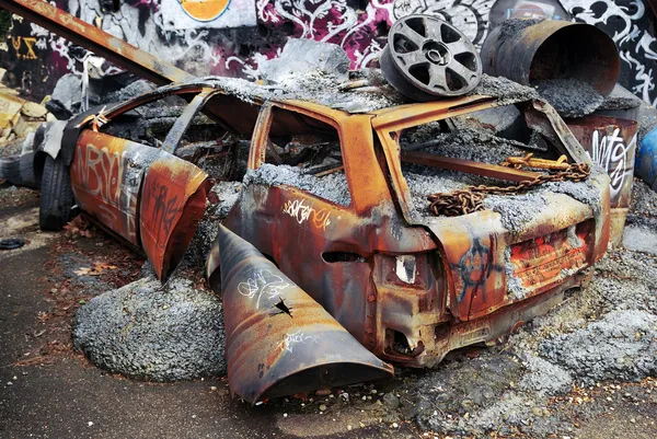 Deteriorated rusty car by ANTHONY DOUANNE Stock Photo Editorial Use Only