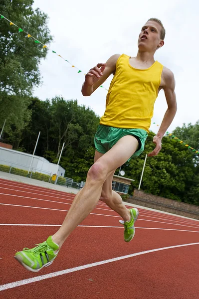 Running athlete in mid-air