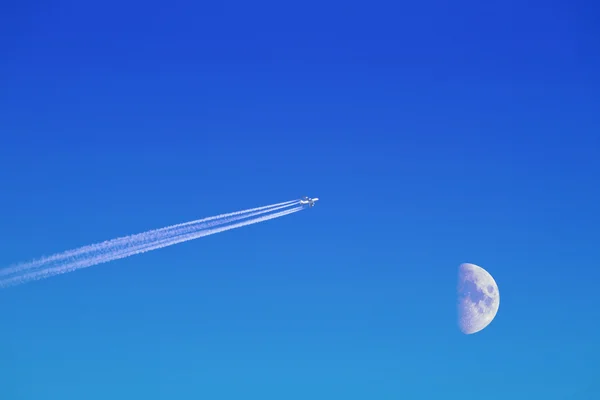Airplane and moon