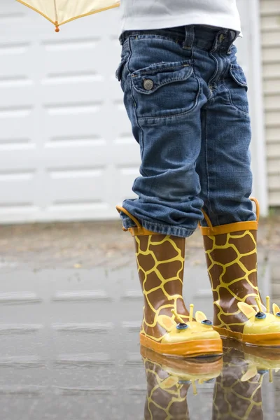 Girl in Cute Galoshes from Waste Down