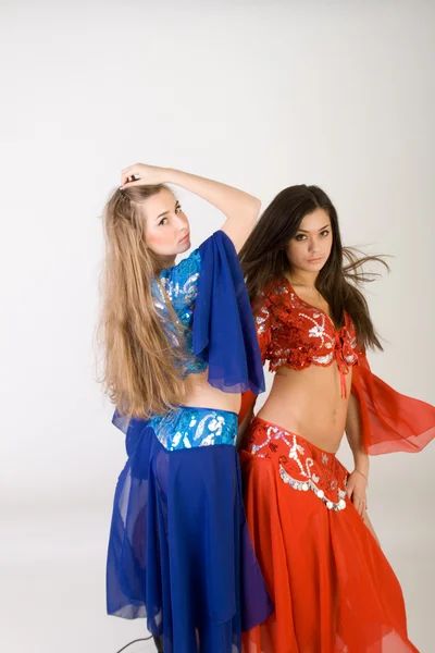 Two girls belly dancing in studio