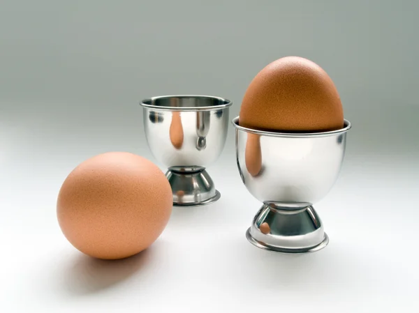 Red chicken egg in stand