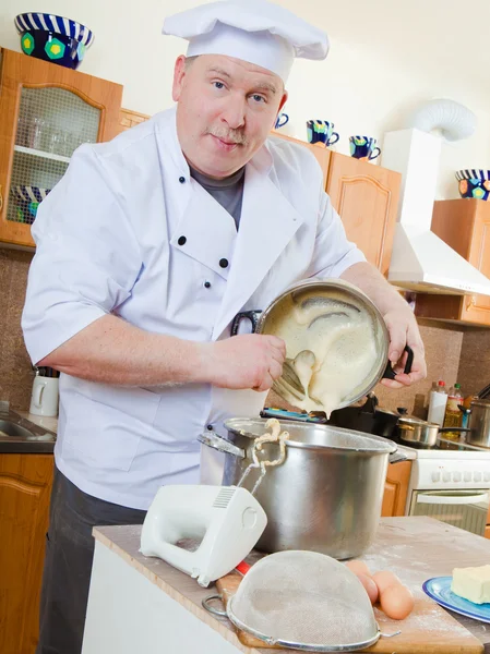 man in kitchen