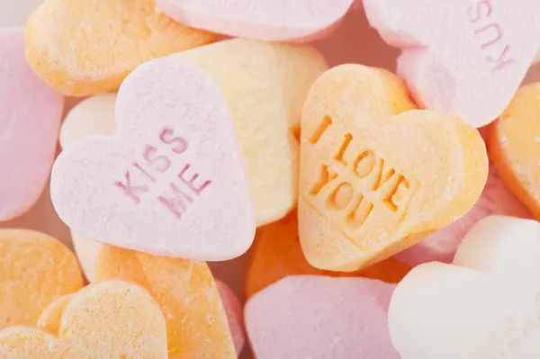Love you and kiss me candy hearts
