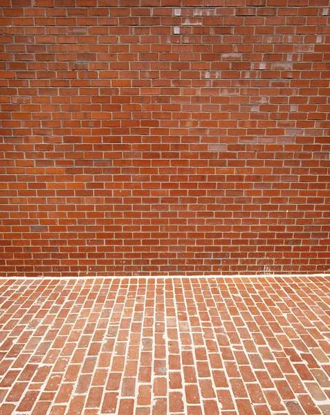 Brick wall and sidewalk
