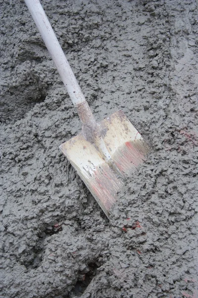 Shovel in Wet Concrete