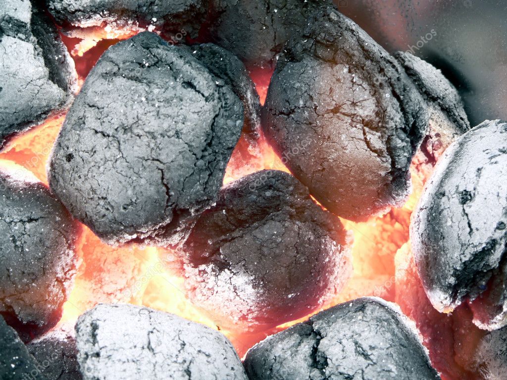 Charcoal smoldering in flames — Stock Photo © tdoes1 2268239
