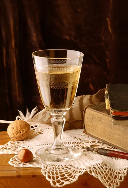Vintage still life with glass of wine