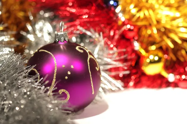 Purple christmas ball with gold pattern