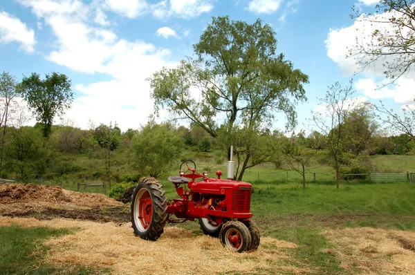 Old Red Tractor on Farm