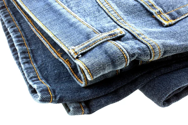 Blue denim jeans on white background