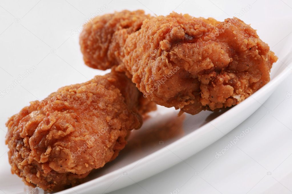 Two crispy fried chicken drumsticks — Stock Photo © jarenwicklund 2670815