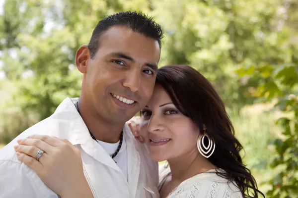 Happy Hispanic Couple in the Park