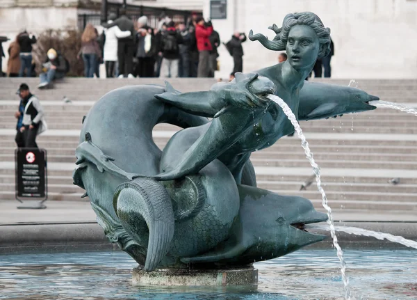 A fountain in Trafalgar Square, London
