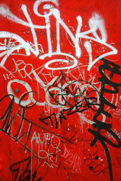 Graffiti on red, vertical
