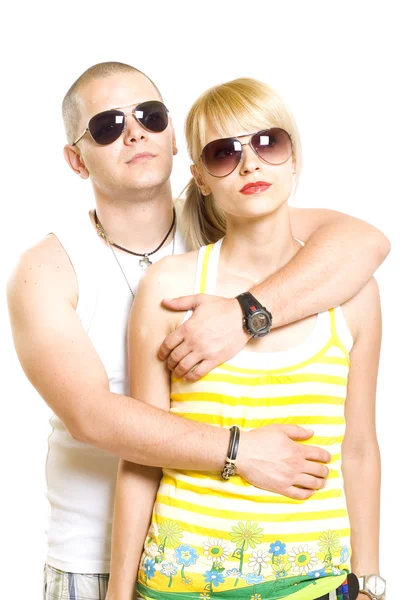 Young trendy couple wearing sunglasses