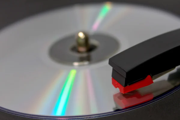 CD Spinning on Vinyl Record Player
