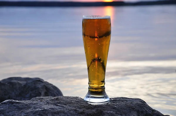 Cold beer on rock