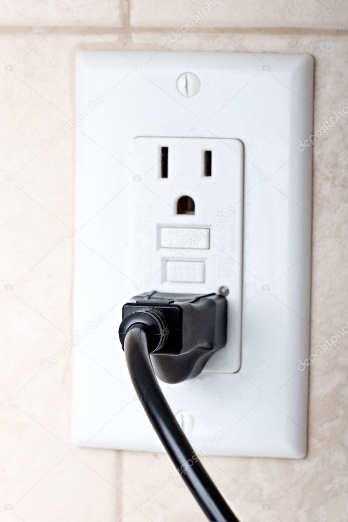 depositphotos_2423579-stock-photo-power-cord-plugged-in-a.jpg